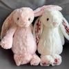 Floral Bunny Doll In White, Deep Pink, Light Pink, Brown, Grey, and Purple by Jellycat