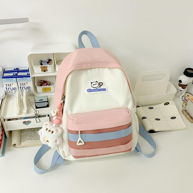 New Small Fresh Contrast Bag Light and Casual Outdoor Backpack High capacity Backpack for Junior and Senior High School Students.