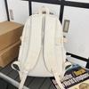 Schoolbag high-value simple casual couple travel backpack large capacity junior high school students multi-compartment backpack men