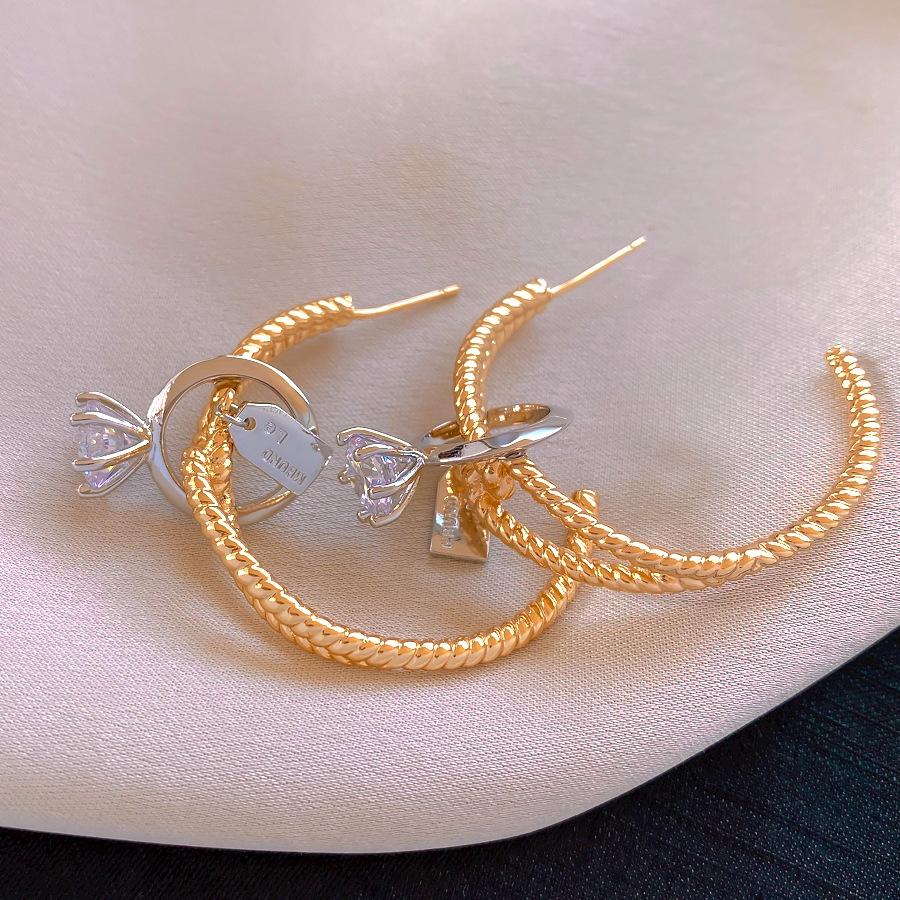 European and American C-shaped knotted geometric zircon earrings, stud earrings, fashionable personalized earrings, women