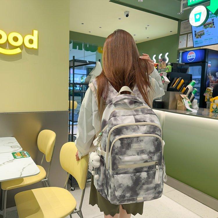 Schoolbag female simple new large-capacity student backpack junior high school students niche high value leisure travel backpack