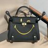 New Genuine Leather Women's Bag Head Layer Leather TOGO Leather Shattered Dimension Cartoon Graffiti Smiling Face Doll Women's Bag