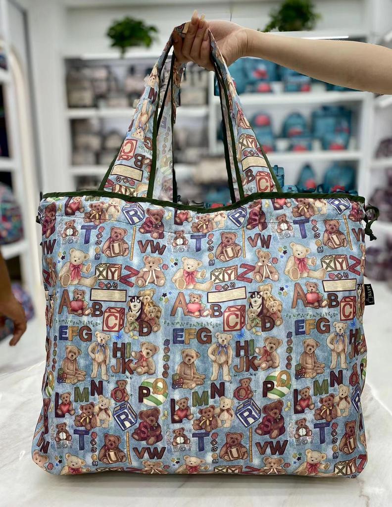 Eco-friendly Lightweight Water-repellent Foldable Shopping Bag with Drawstring Closure and Large Capacity