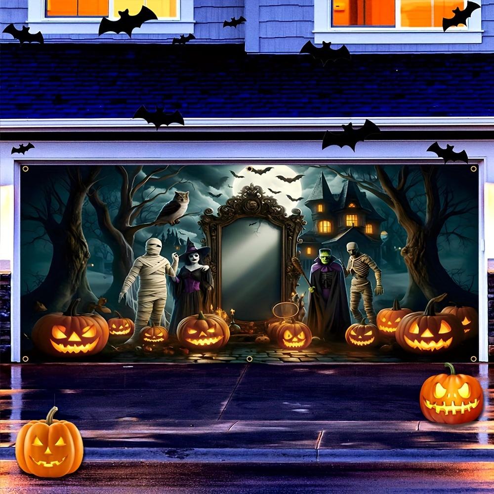 A Halloween garage door banner featuring terrifying bandages monsters witches bats pumpkins owls and dead trees