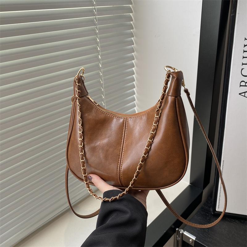 

Популярная в этом году женская сумка 2025 новая модная высококлассная с чувством зарубежного стиля на плечо подмышку ретро универсальная сумка-мессенджер коричневый