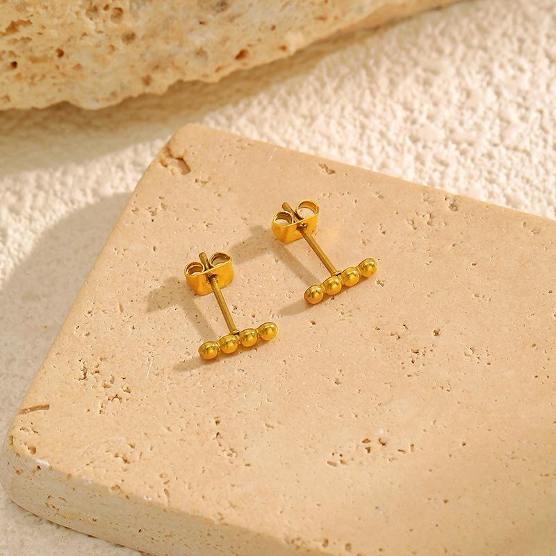 Titanium steel simple and versatile gold bead stud earrings women's fashion commuter light luxury earrings plated with 18K gold stainless steel earrin