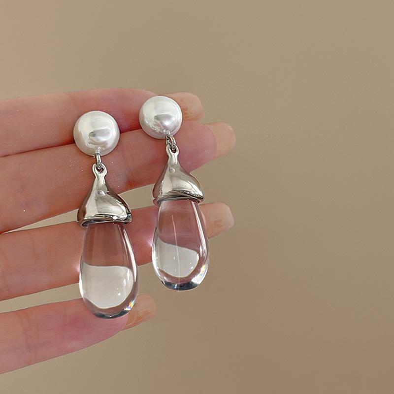 Silver Needle White Heart Tassel Earrings: Luxurious, Versatile, and Stylish Stud Earrings for Women.