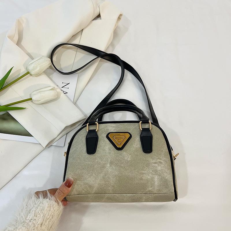 

Premium texture retro small bag women s bag 2025 new spring popular versatile messenger bag portable bowling bag