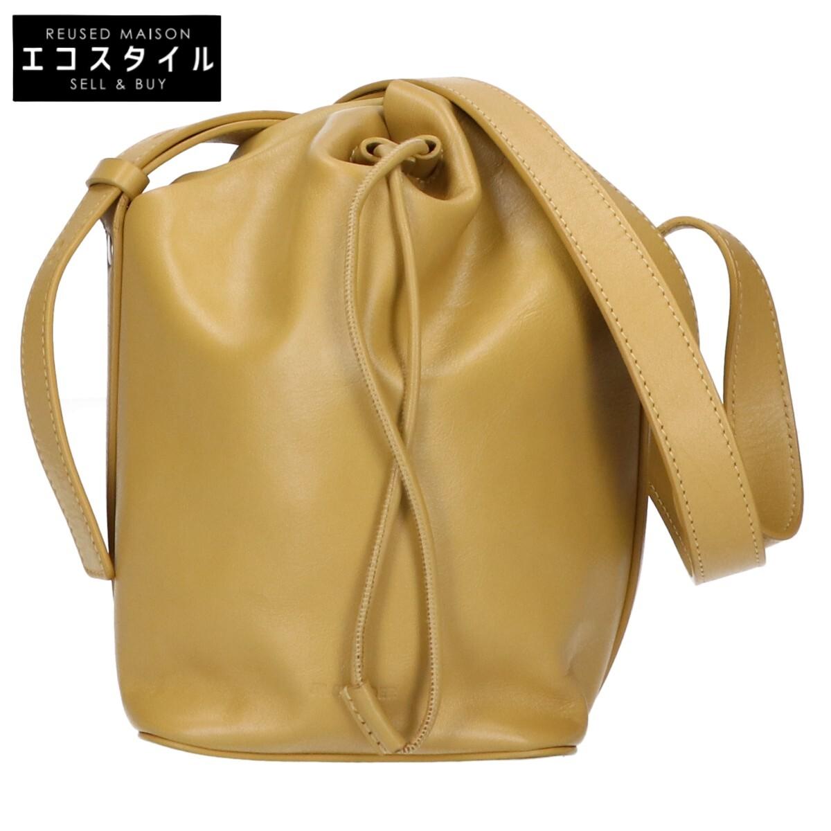 

JIL SANDER Leather bucket-shaped drawstring bag Shoulder bag mustardUsed