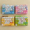 Simulations-Tastatur 26-Tasten-Tastenkappe Clicker Süßigkeitenfarbe Fidget Schlüsselanhänger Spielzeug Tasche Zubehör