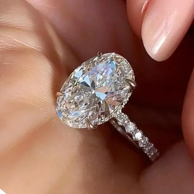2026 Inlaid Oval Pigeon Egg Cube Zirconia Ring, Fashionable and Personalized Platinum Engagement High-quality Jewelry