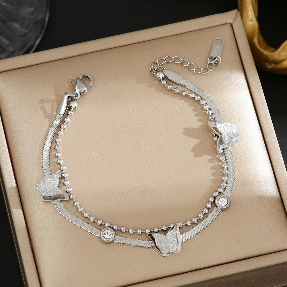 Luxe Titanium Staal Vierbladig Klaver Armband in Koreaanse Stijl met Ingelegde Diamanten voor Vrouwen - Kleurvast