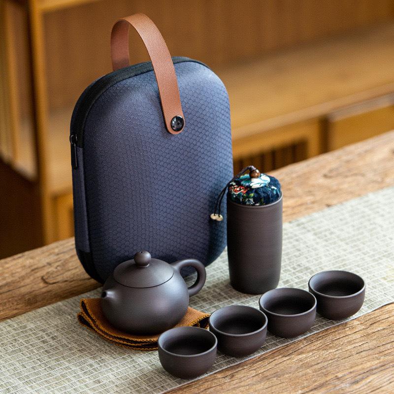 Portable Purple Clay Gongfu Tea Set: Includes 1 Pot and 4 Cups with Ceramic Dry Brew Travel Bag for Outdoor Use.