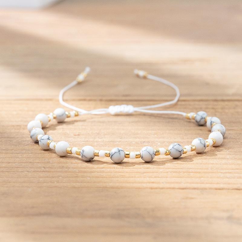 Bohemian colored rice bead bracelet women's ins wind niche faceted stone adjustable hand rope jewelry tide