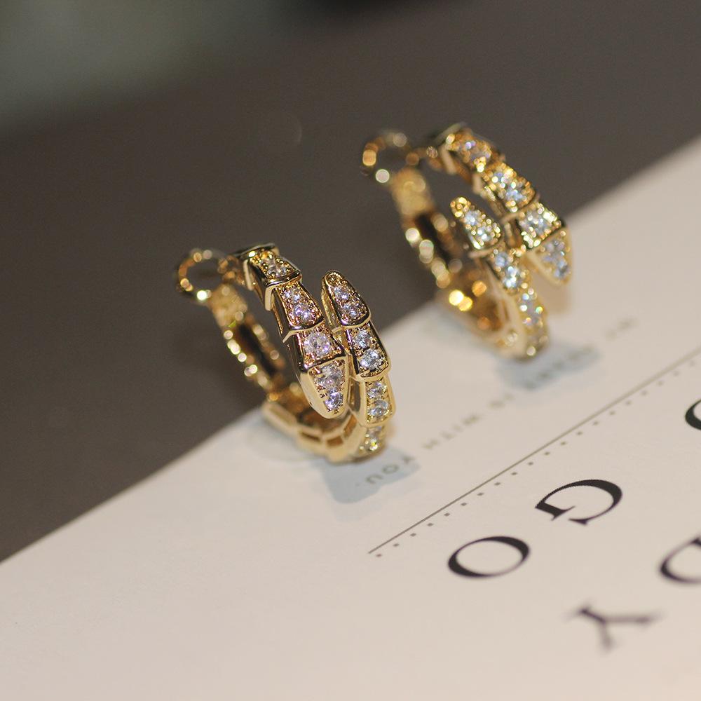 

Серьги Lux Snake с инкрустацией из циркония и иглой из серебра 925 пробы