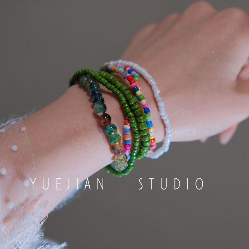 

Летняя жара ~ Красочный набор из бисера Браслет Женский Многослойный Двойной Ремешок Элегантный Милый Свежий Ручные украшения A set of green bracelets