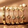 Elegant Gold-Tone Titanium Four-Leaf Clover Bracelet Set - Luxurious and Versatile Fashion Jewelry
