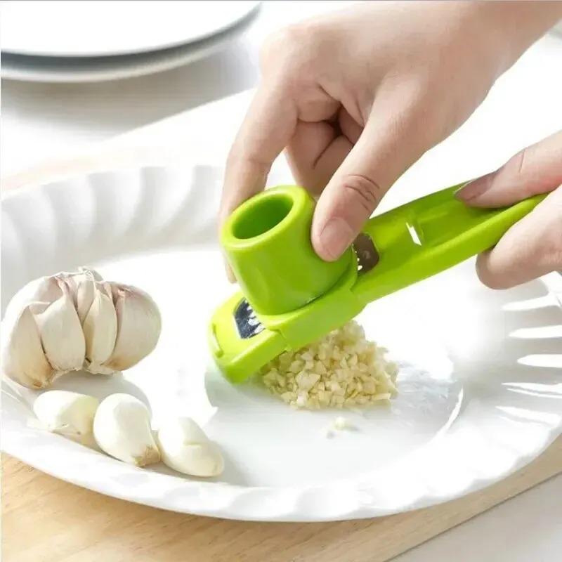 1 balení Mini mlýnek na česnek Creative Lis na česnek Kuchyňská česneková kaše Ruční šťouchání česneku Zelené kuchyňské pomůcky