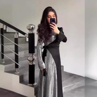 Conjunto de vestido de lentejuelas empalmado de manga larga temperamento