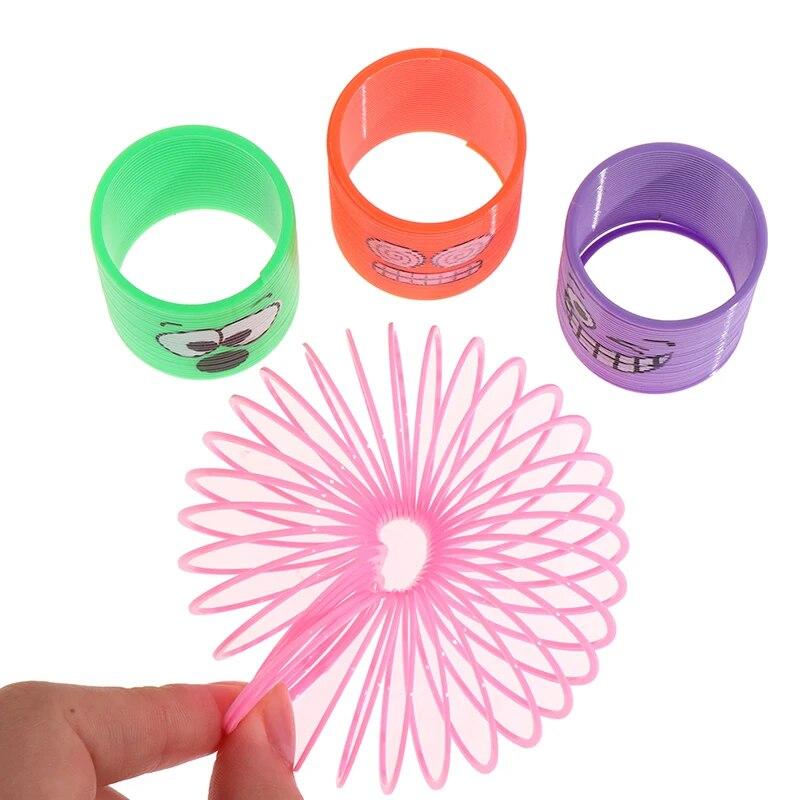 12 Uds. De juguetes circulares de resortes mágicos de arcoíris para niños, recuerdos de fiesta de cumpleaños, regalos, recuerdo, rellenos para piñatas para invitados de guardería