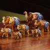 Resin Seven Elephant Tuskers Showpiece For Home Décor, Multicolor - Set Of 7