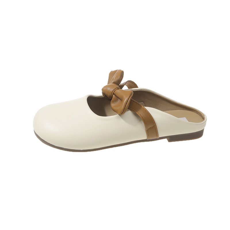 Half slippers female 2025 new spring and summer outer wear fairy style soft flat bottom bag head single shoes French bow sandals
