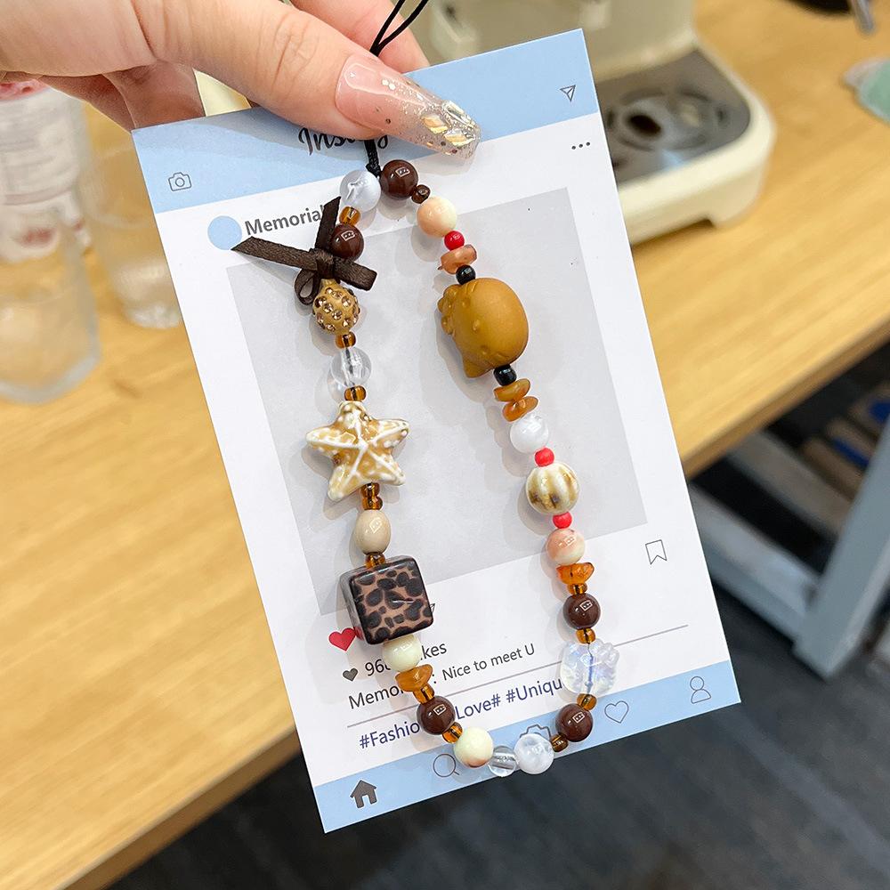 Fashion High-end Mobile Phone Lanyard Creative Girl Heart Handmade Beading a Variety of Styles Universal Mobile Phone Chain Advanced Sense