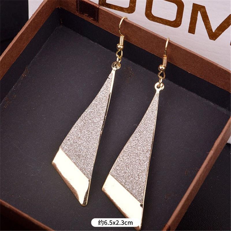 Fashion exaggerated niche temperament fringed earrings retro personality versatile sequined earrings women's long ear jewelry
