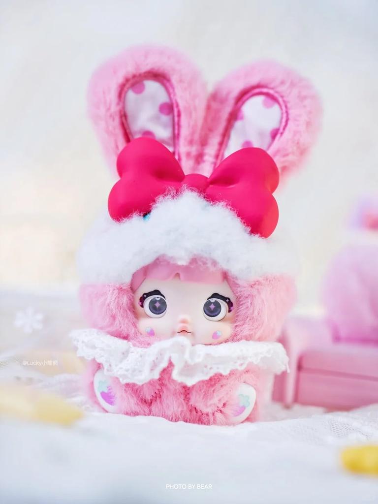 Nommi Plush Mascot Keychain Blind Box Fluffy Exterior Rigid Interior for Standing Includes 3 Rotating Perfect as a Bag Charm or Tabletop Decor 8 Types