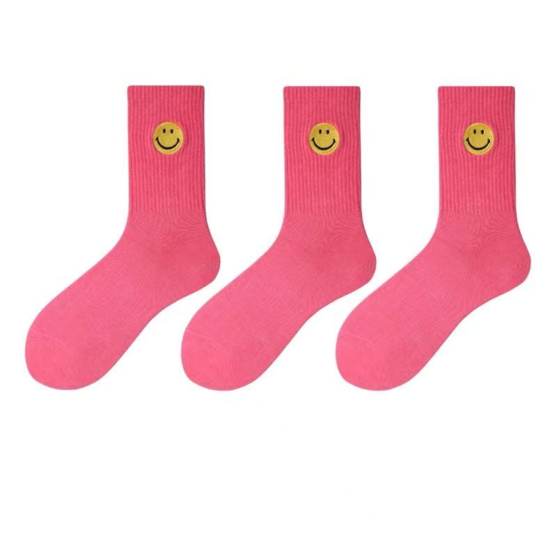 Einfarbige, mittellange Socken mit frischem, lächelndem Gesichtsmuster, schlichtem Design, bequem und atmungsaktiv.