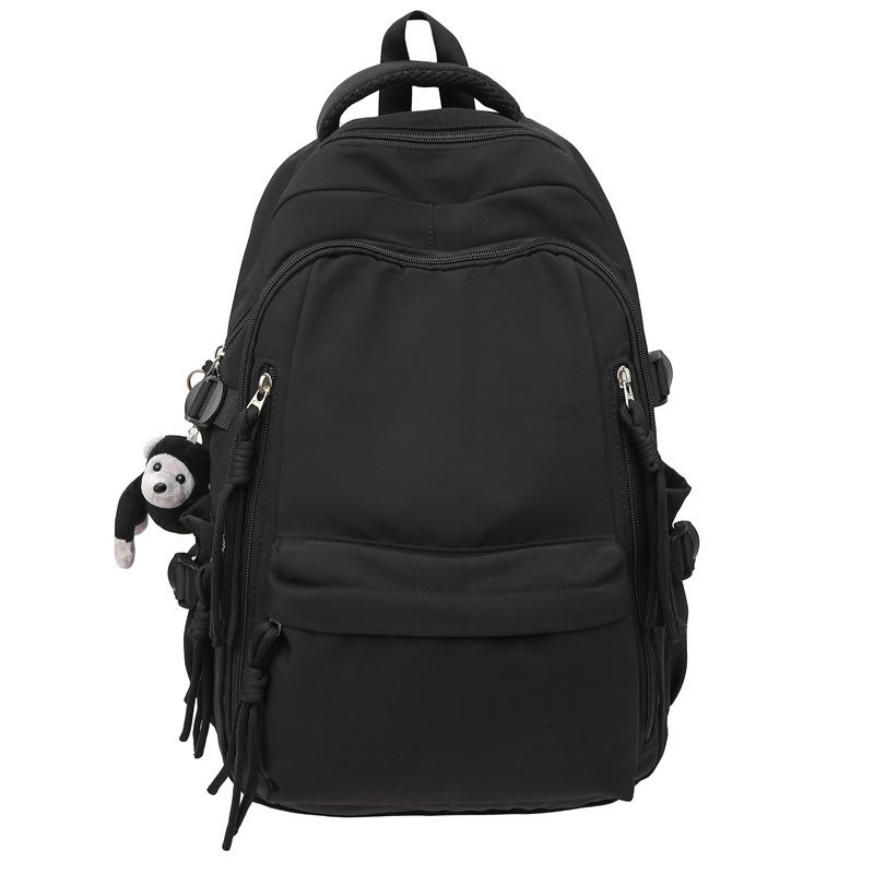 Ryggsäck för män i enfärgat utförande Ryggsäck för kvinnor med flera fickor Stor kapacitet Student Skolväska