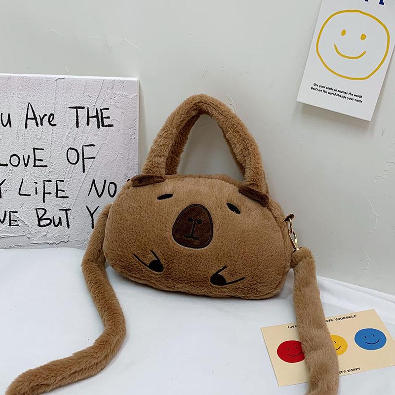 

2025 осень и зима новая плюшевая сумочка для девочек, милая и универсальная шерстяная сумка, женская мультяшная на плечо, сумка-мессенджер One size