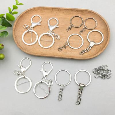 Balta raktų pakabukas su senovinio sidabro lydinio pakabuku "pasidaryk pats" papuošalams