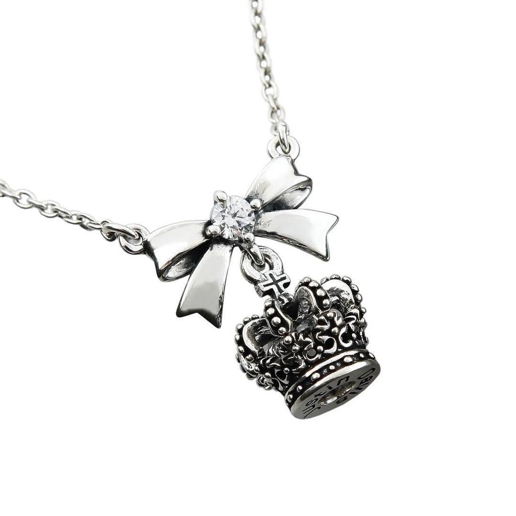 Used Justin Davis crown necklace