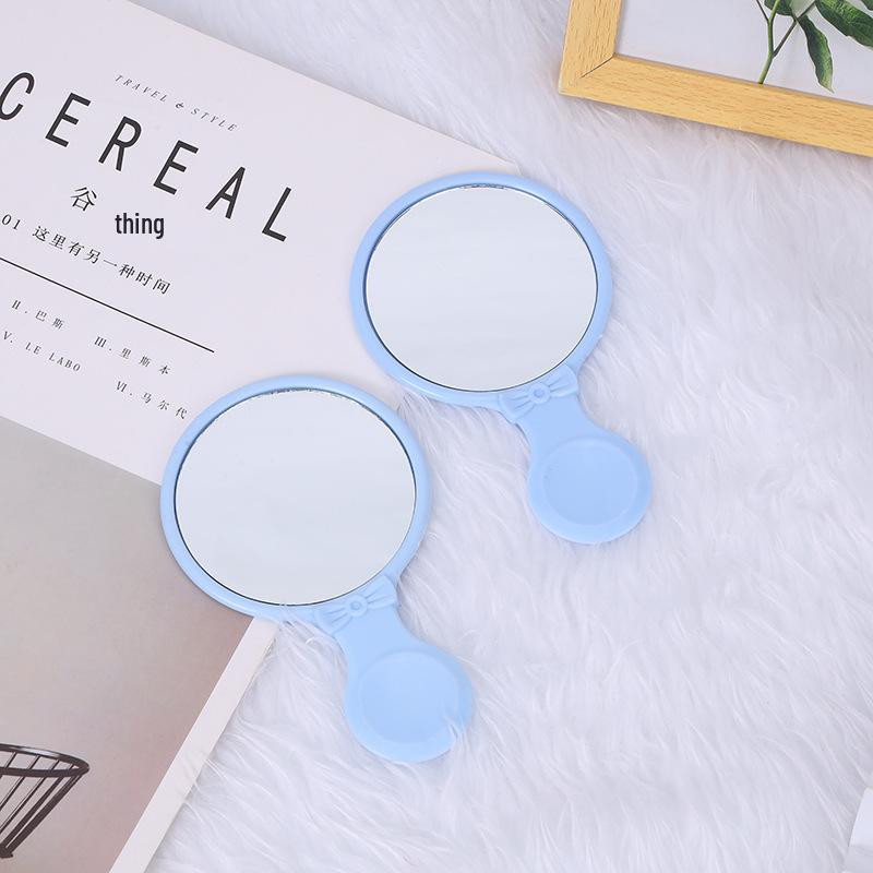 Kompaktes Handspiegel- und Kammset - Tragbar und taschenfreundlich für die Haarpflege