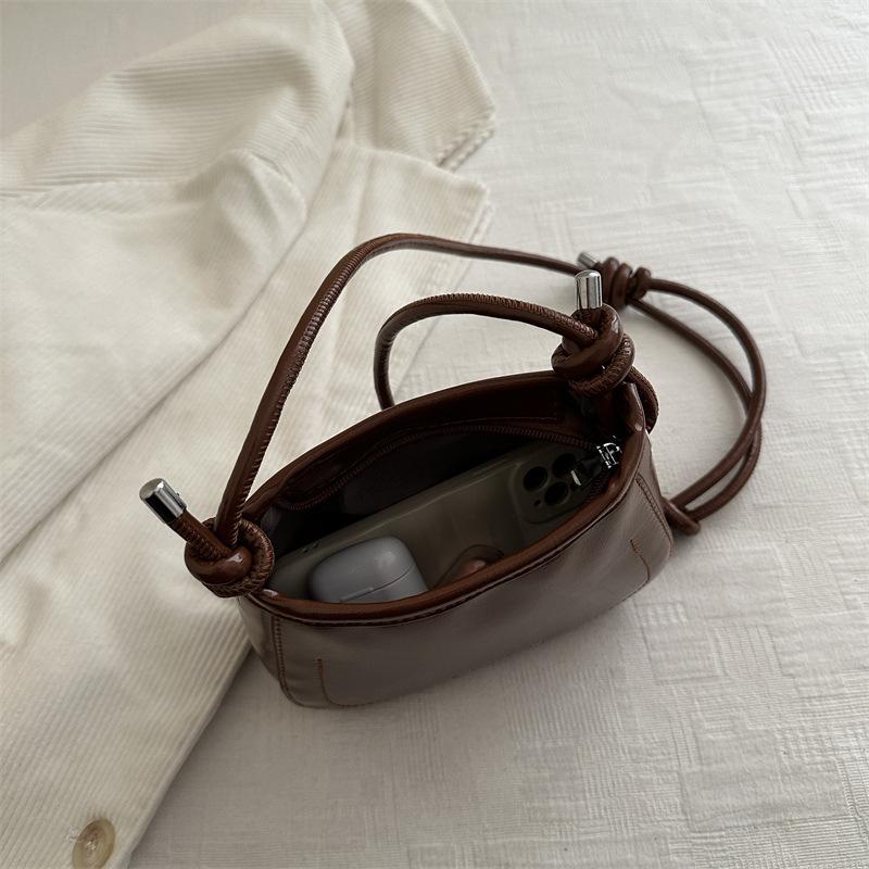Korean version of fashionable underarm bag women's new simple hand shoulder bag PU texture foreign style messenger small square bag