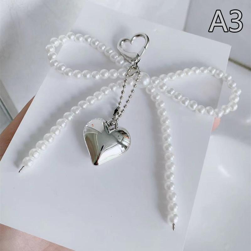 Perlový přívěsek Srdce Přívěsek na klíče Korálkový přívěšek na telefon Odnímatelné mašle Přívěšek na telefon Ručně vyráběný přívěsek na klíče Šperky do kabelky