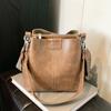 Bag Korean high-end sense versatile bucket bag autumn and winter retro niche design new broadband messenger bag women