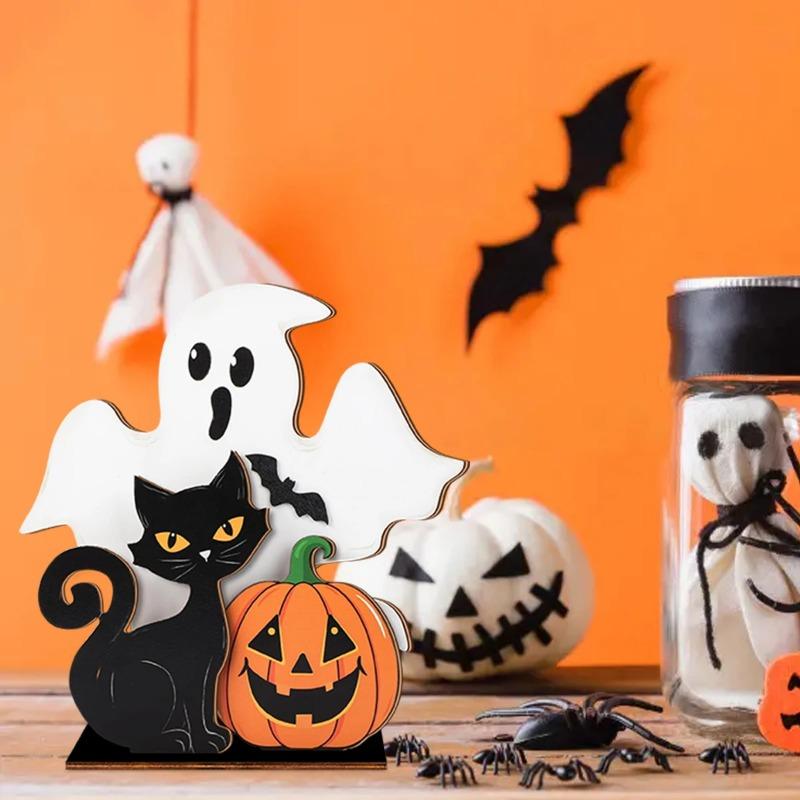 Halloween wooden decorations: ghost statues, black cats, and pumpkins, used for home party decoration