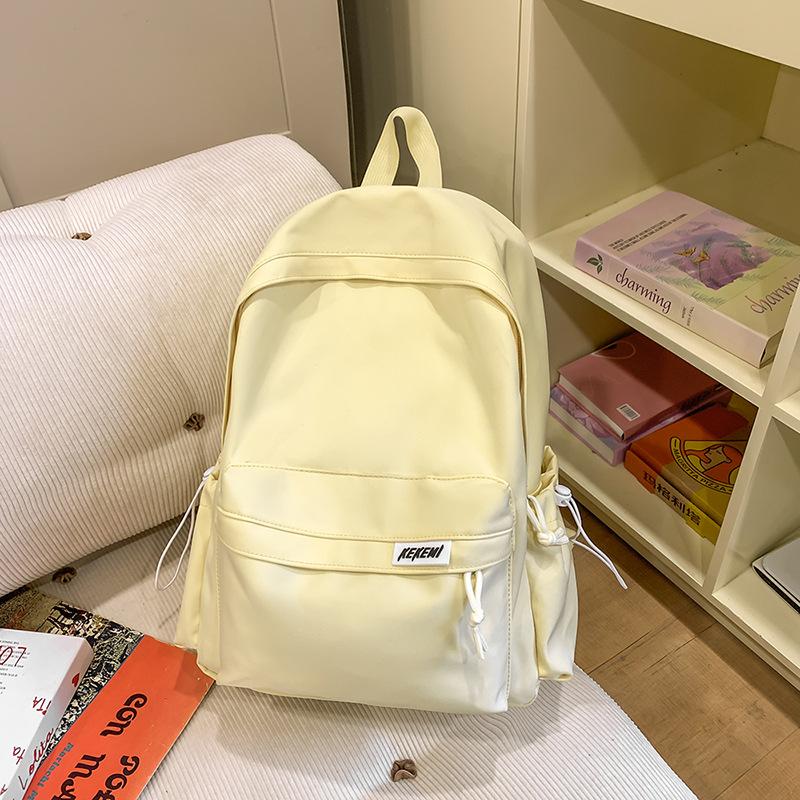 Simple casual large-capacity backpack women's new junior high school high school student schoolbag versatile travel backpack