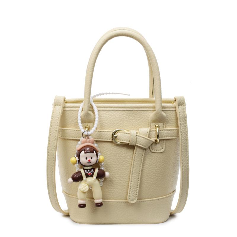 Hot sale in spring and summer Korean simple lychee pattern texture portable bucket bag casual commuting versatile solid color messenger women's bag