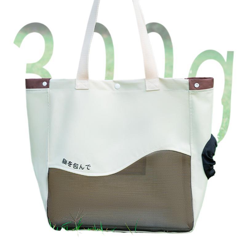 Portable Canvas Dog & Cat Carrier: Crossbody, Breathable, Head-Out Design for Small Pets.