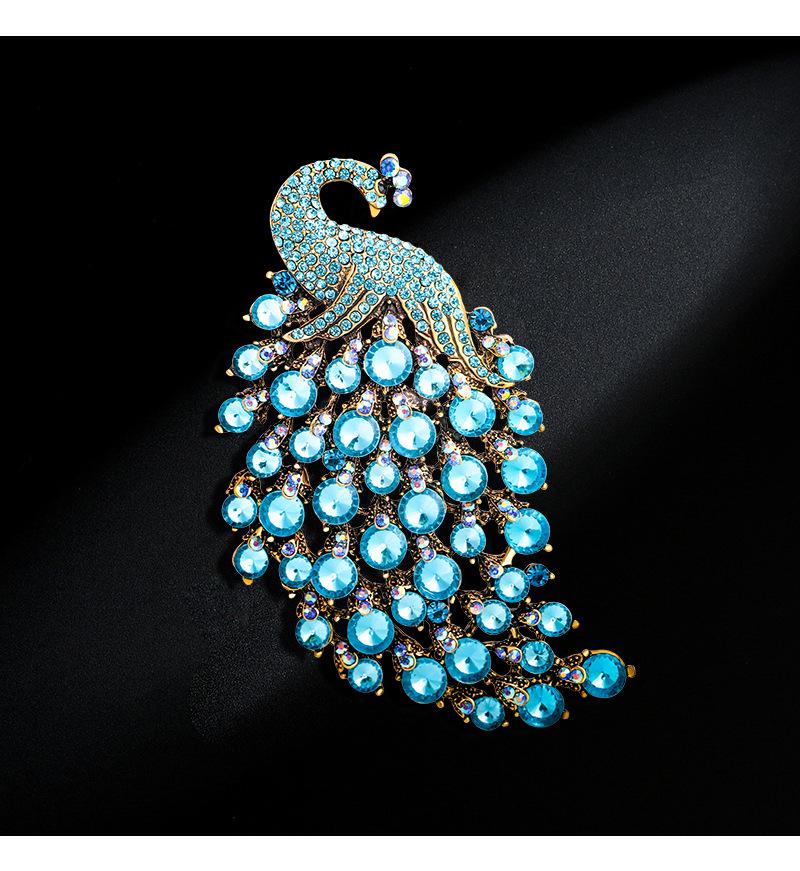 Bunte Pfau-Brosche - Diamantenbesetztes Modeaccessoire für Damen