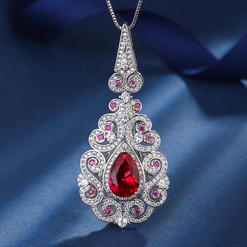 

Ювелирные изделия Медное основание Позолоченное Имитация Красного Корунда Придворный стиль Ретро Костюм Камень героини 8 * 12