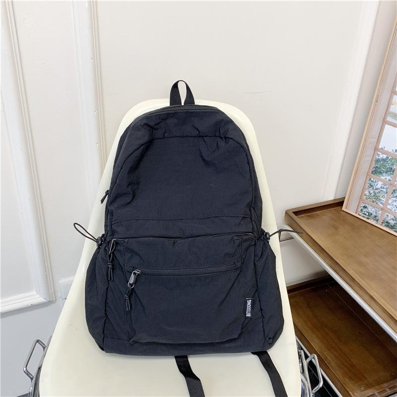 Schoolbag Japanese ins color matching schoolbag for female junior and high school students, large-capacity backpack, pleated sense, lightweight 