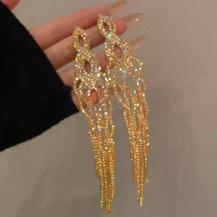 UK Noble Young Lady Luxury Long Tassel Diamond Earrings - High-End Design, Elegant and Exaggerated Style for Women.