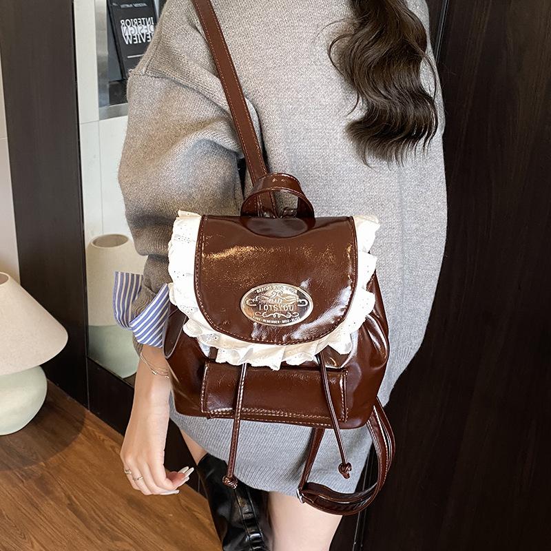 

Vintage college style backpack bag 2025 new women s niche design Korean version ins casual versatile backpack коричневый
