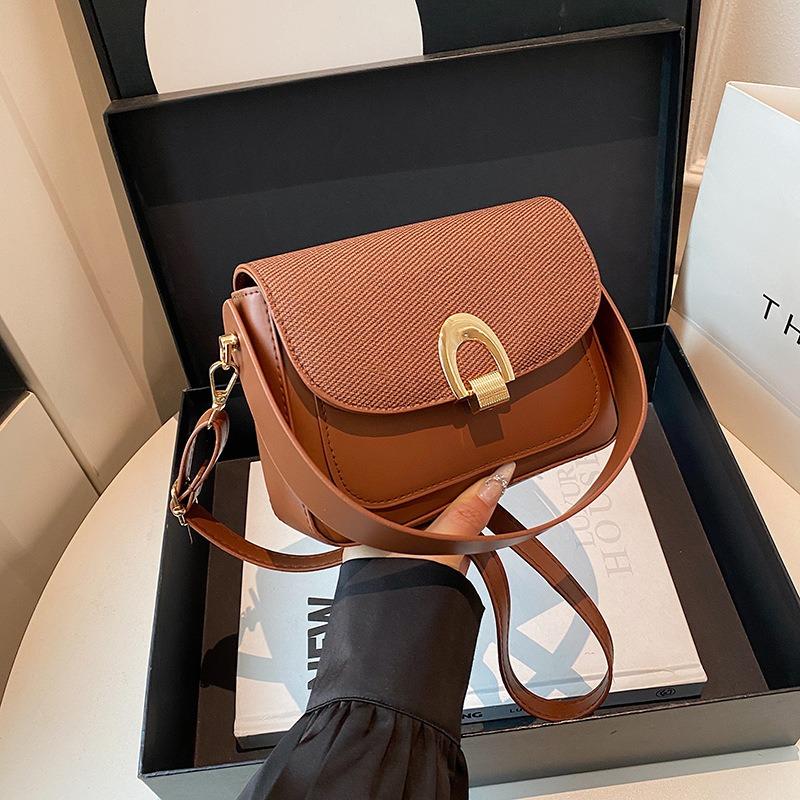 Retro niche underarm bag women's new trendy fashion saddle bag simple and versatile shoulder messenger bag