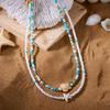 Perlenketten-Set für Damen 2 Stück Samenperlen-Choker mit Meeresschildkröte Seestern Anhängern Layering Sommer Boge Strand Schmuck