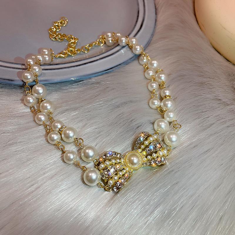 Diamantbesetzte künstliche Perle Doppelkreis Liebesohrringe Französische Retro-Steckohrringe Exquisite Ohrringe Damen